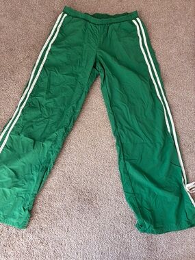 Green Track Pants with White Side Stripes